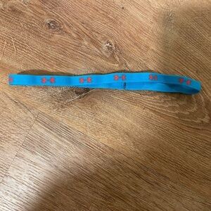 Under Armour blue and bright red thin headband​​​​​​​